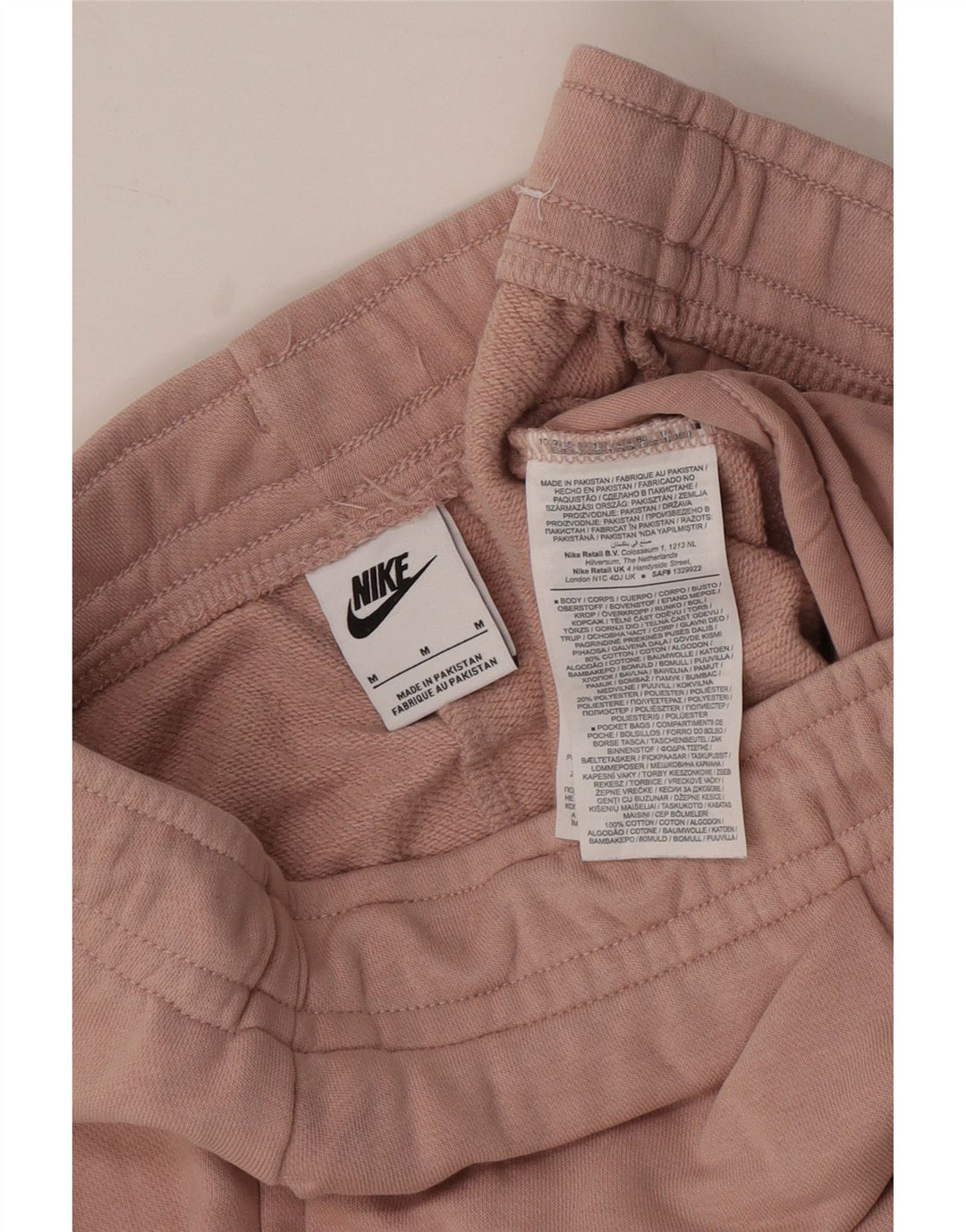 NIKE træningsdragt til kvinder Joggers UK 14 Medium Pink Bomuld