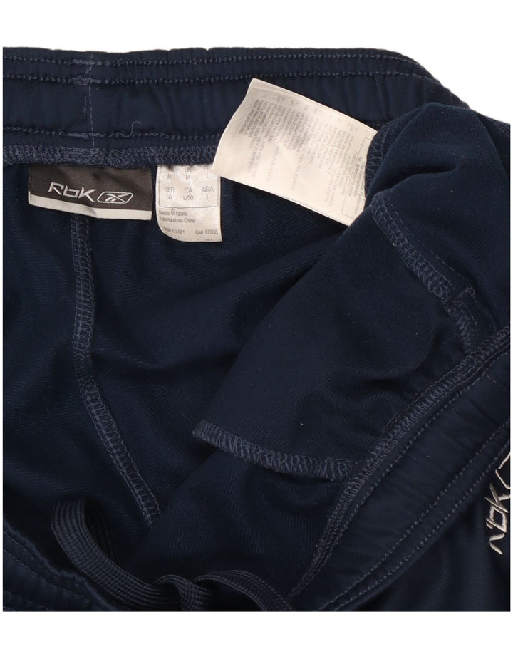 Reebok Træningsdragt bukser til mænd Medium Marineblå Colourblock Polyester