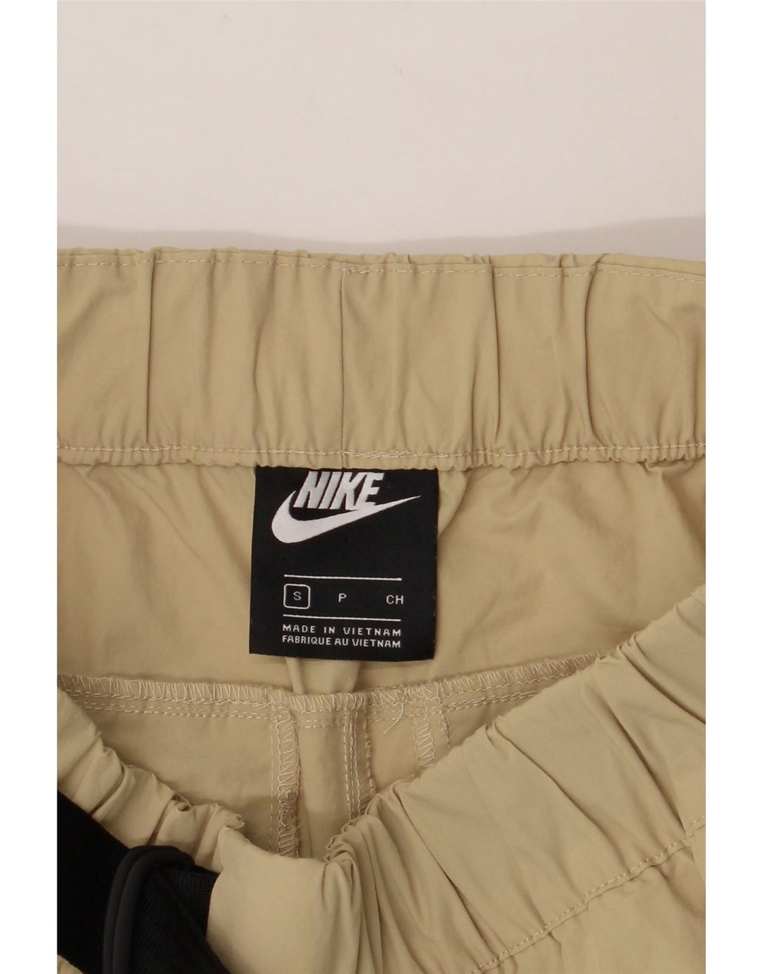 NIKE Mens Slim Casual Trousers Small W28 L29 Beige Polyester Vintage Nike and Second-Hand Nike from Messina Hembry 