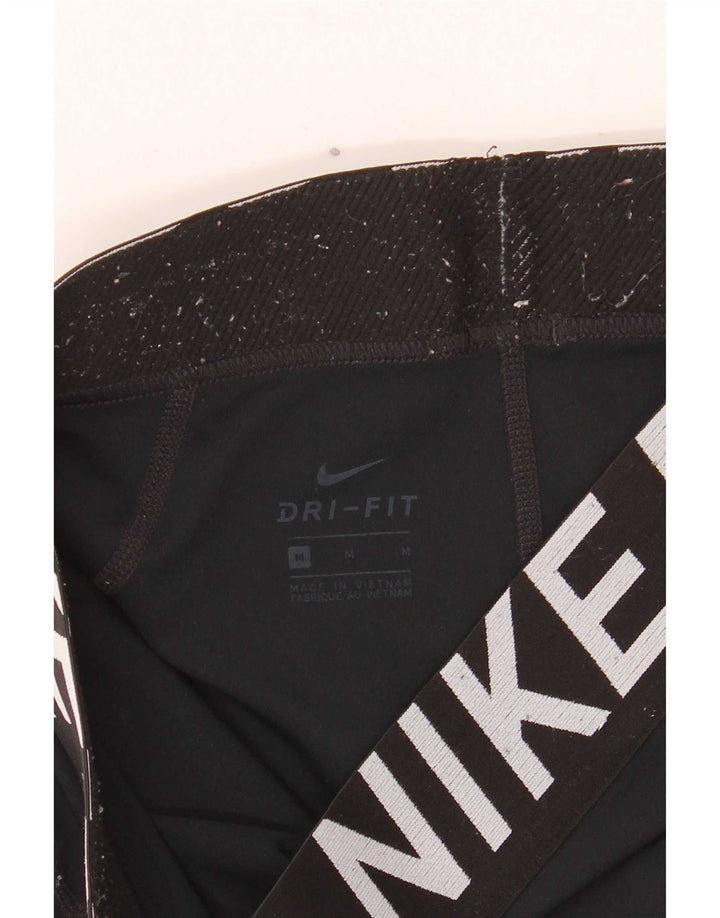 Nike Dame Dri Fit grafiske sportsshorts UK 12 Medium Sort