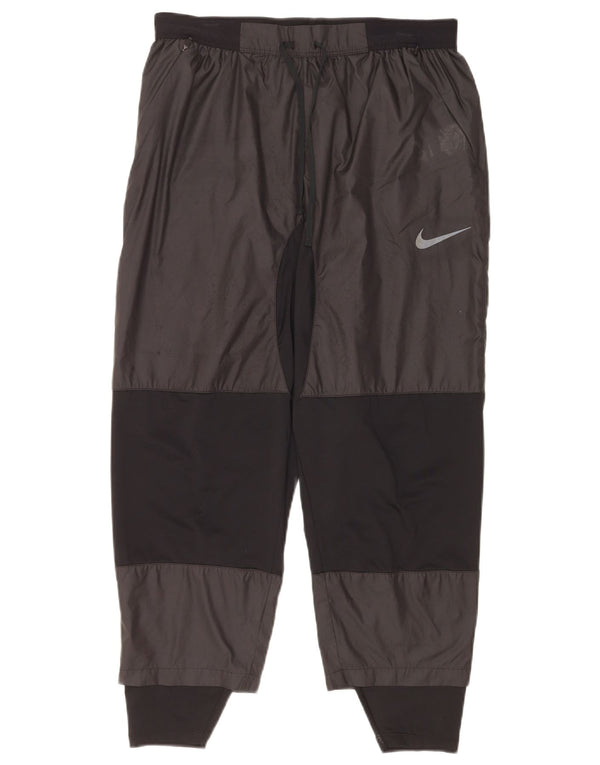 Nike Træningsdragtsbukser til mænd Large Black Colourblock Polyester