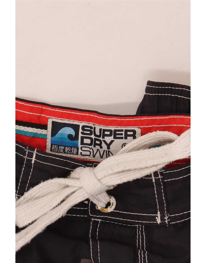 Superdry grafiske badeshorts til mænd mellem marineblå polyester