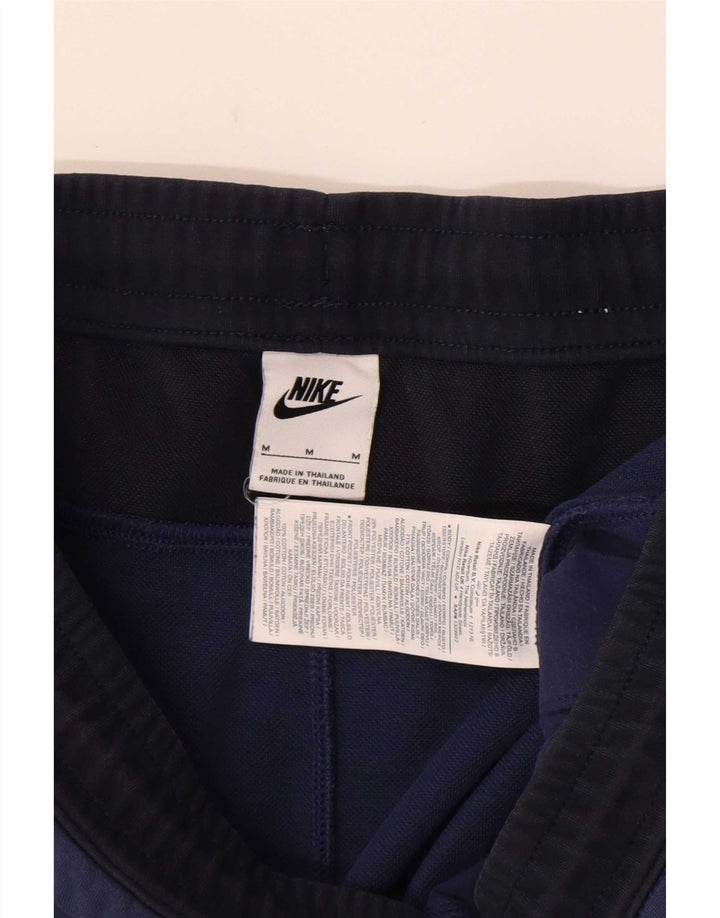 Nike Træningsdragt bukser til mænd Joggers Medium Marineblå Colourblock Bomuld