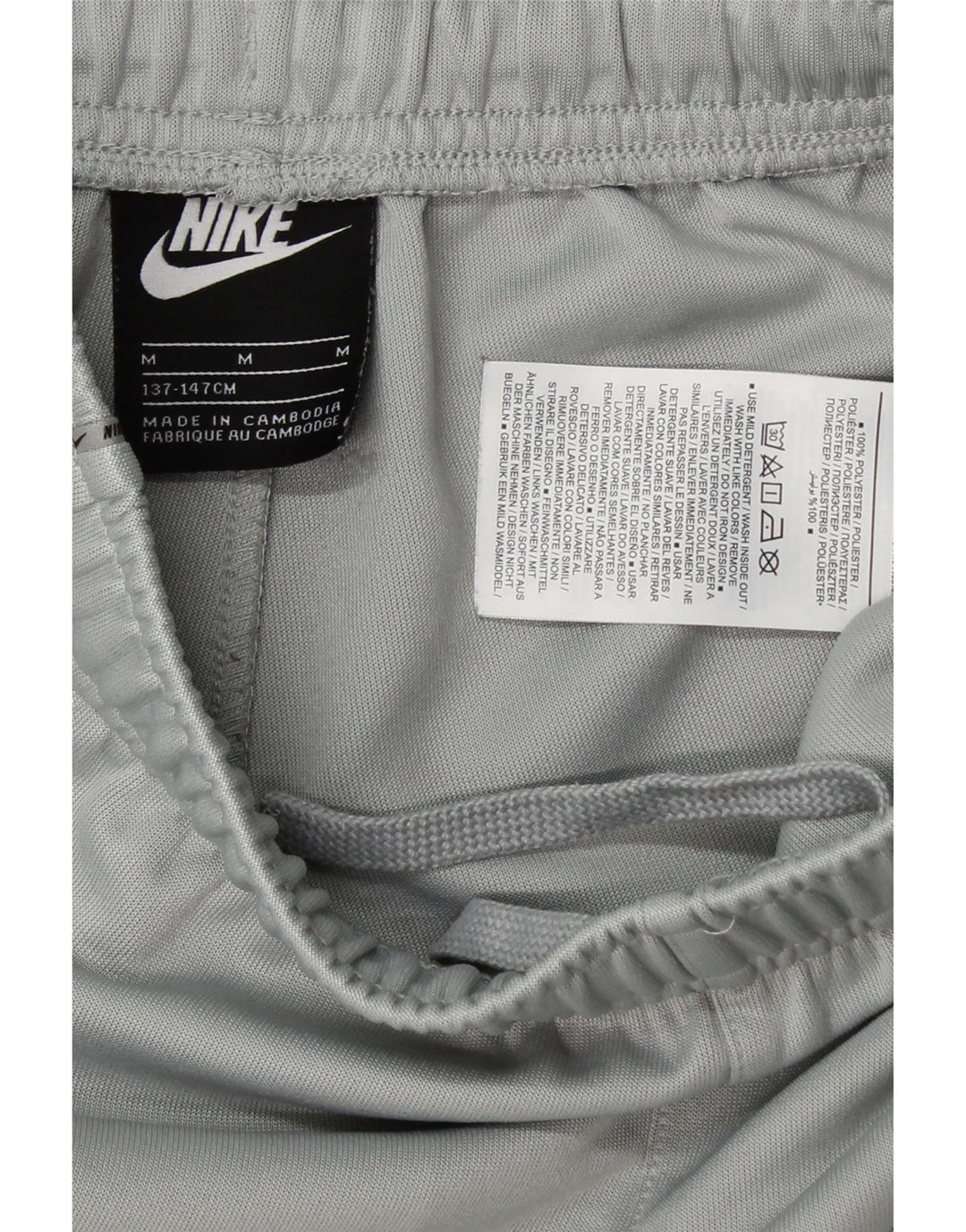 NIKE Boys Graphic Tracksuit Trousers Joggers 10-11 Years Medium Grey Vintage Nike and Second-Hand Nike from Messina Hembry 