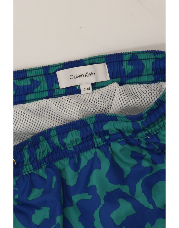 CALVIN KLEIN Boys Swimming Shorts 12-13 Years Blue Camouflage Polyester Vintage Calvin Klein and Second-Hand Calvin Klein from Messina Hembry 
