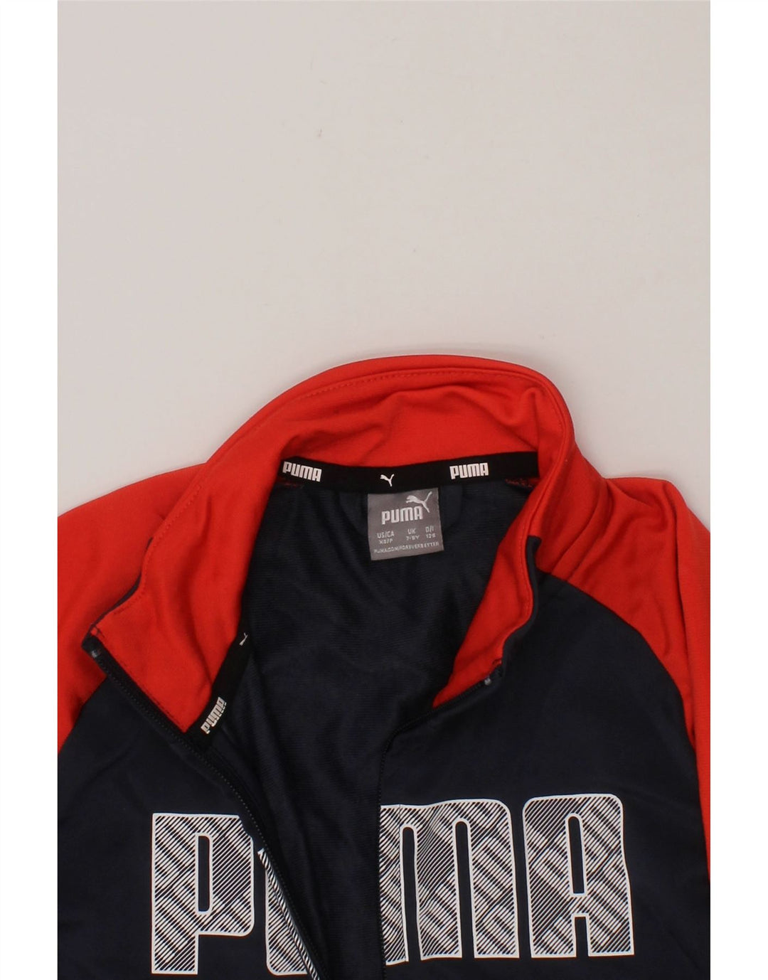 PUMA Boys Graphic Tracksuit Top Jacket 7-8 Years  Navy Blue Colourblock Vintage Puma and Second-Hand Puma from Messina Hembry 