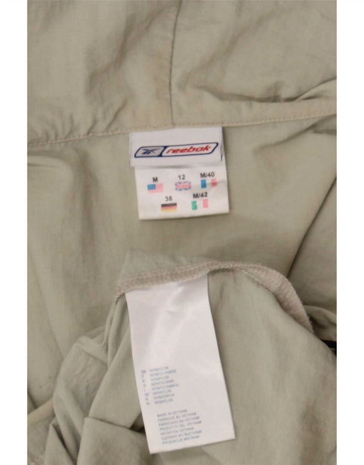 Reebok Regnjakke med hætte til kvinder UK 12 Medium Beige Nylon