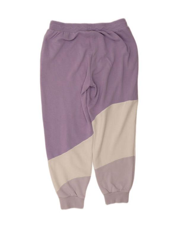 Puma træningsdragt til kvinder Joggers UK 16 Large Purple Colourblock