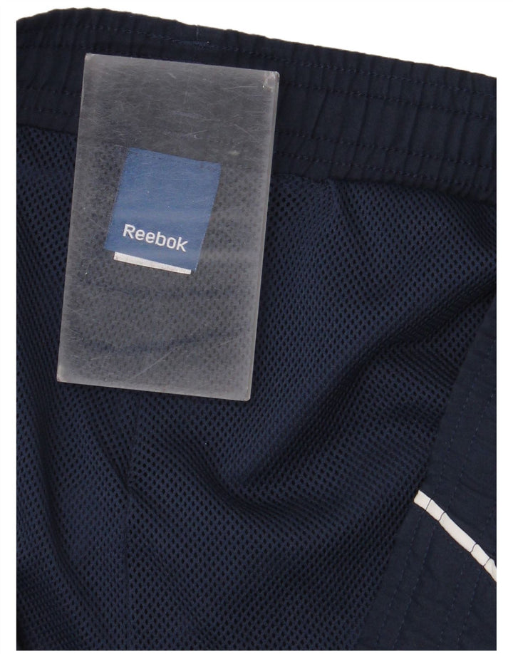 Reebok Træningsdragt til mænd Joggers Small Navy Blue Colourblock