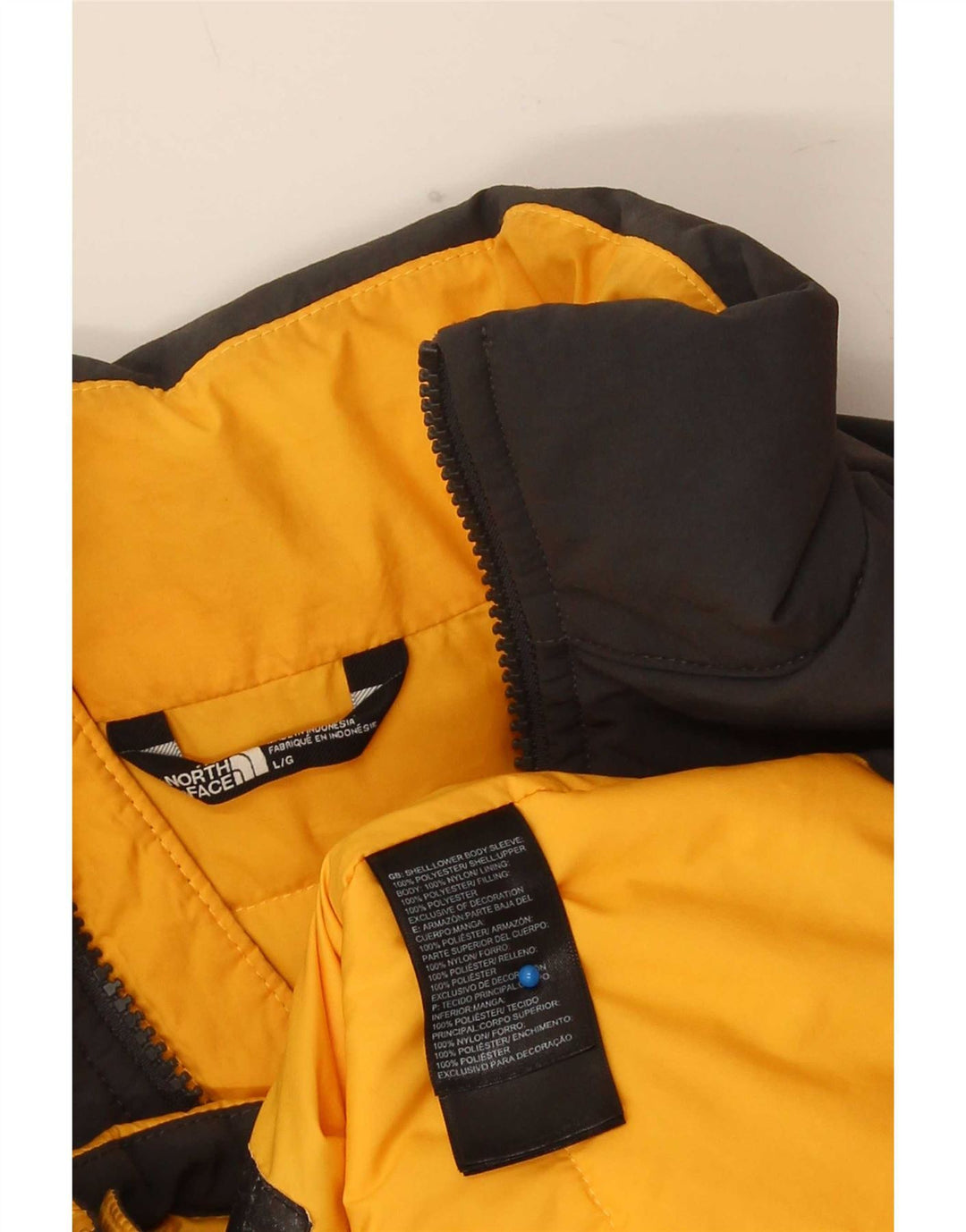 The North Face Boys polstret jakke 11-12 år Stor gul farveblok