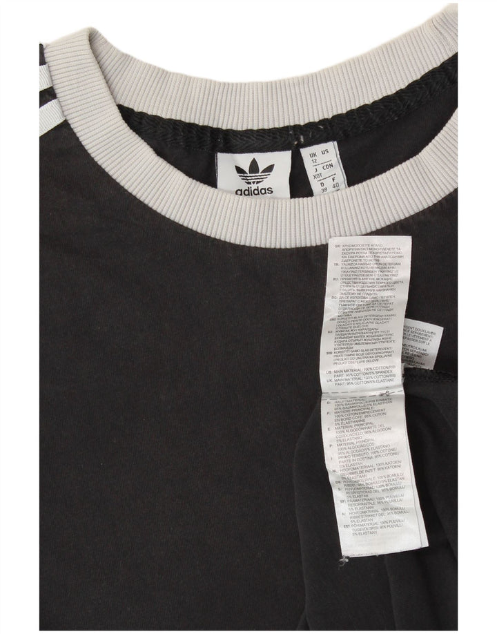 ADIDAS Grafisk T-shirt top til kvinder UK 12 Medium Sort bomuld
