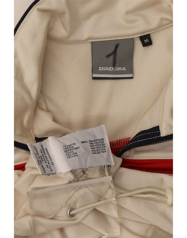 DIADORA træningsdragt topjakke til kvinder UK 14 Medium Off White Colourblock