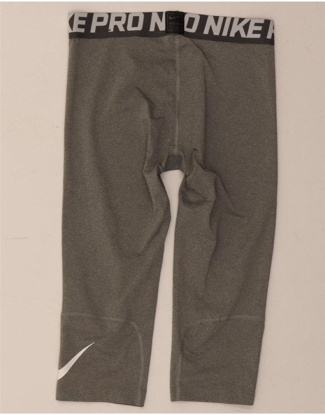 NIKE Girls Dri Fit Graphic Capri Leggings 12-13 Years Large Grey Polyester Vintage Nike and Second-Hand Nike from Messina Hembry 