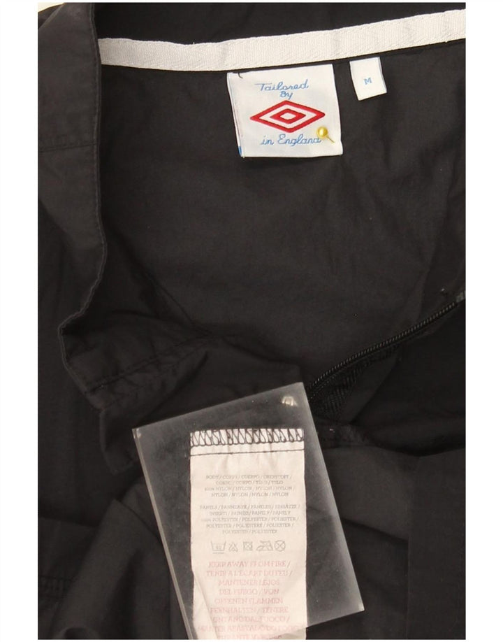 Umbro Grafisk regnjakke til kvinder UK 14 Medium Sort Nylon