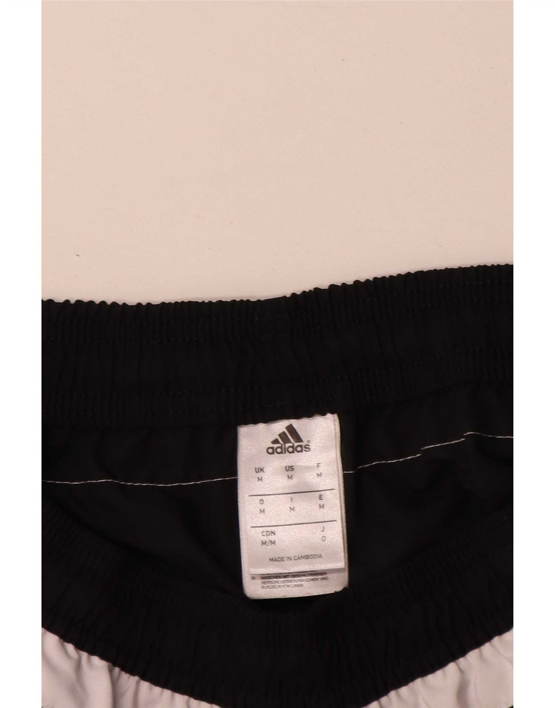 Adidas Sportshorts til mænd mellem sort stribet polyester