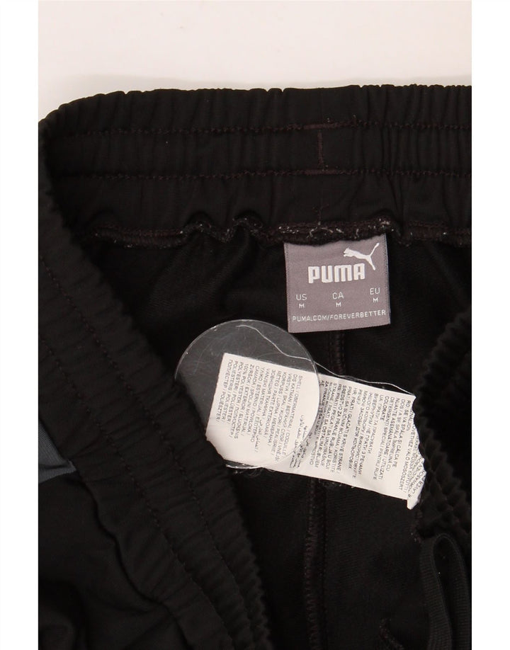PUMA Træningsdragt til mænd Joggers Medium Sort Colourblock Polyester