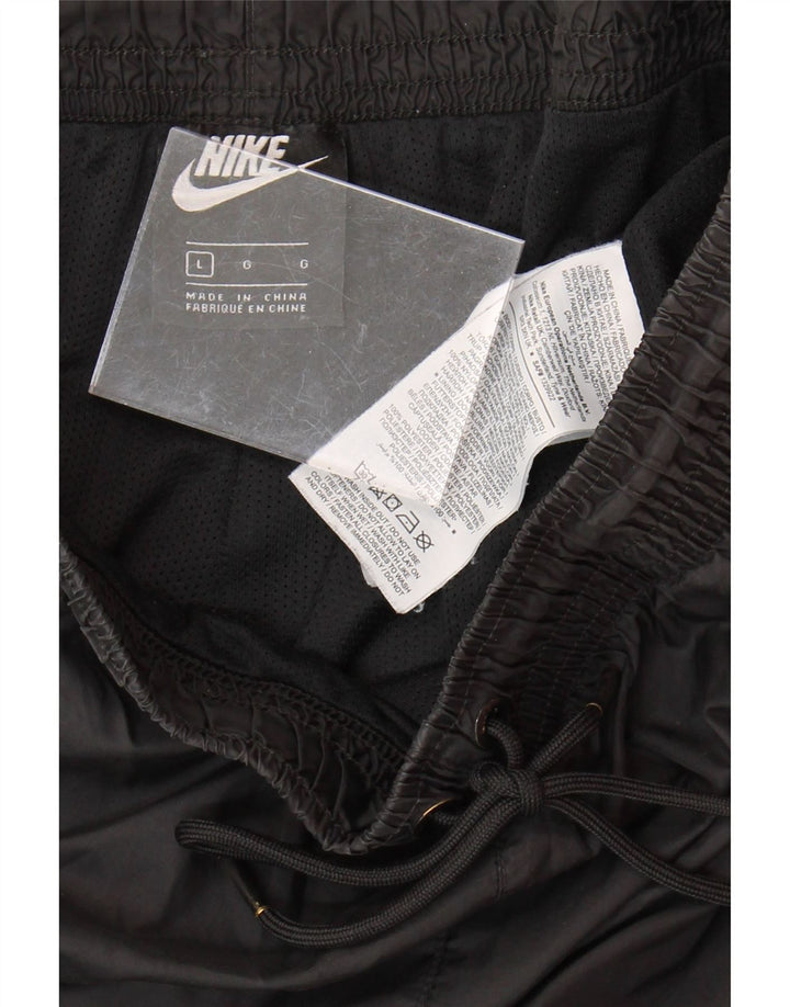 NIKE Mens Tracksuit Trousers Joggers Large  Black Polyester Vintage Nike and Second-Hand Nike from Messina Hembry 