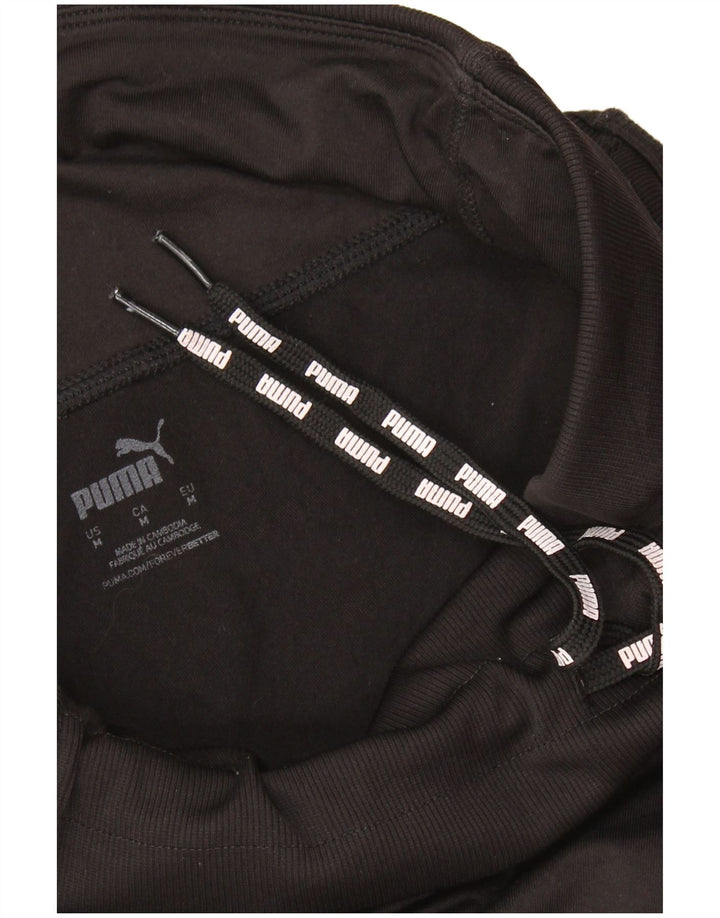 PUMA træningsdragt til kvinder Joggers UK 12 Medium Sort