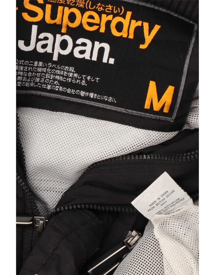 Superdry Regnjakke til kvinder UK 14 Medium Sort