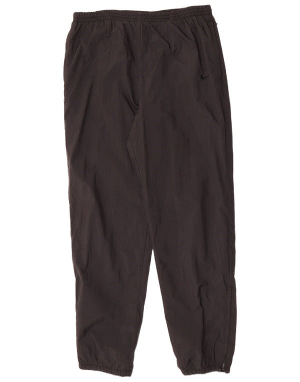 Nike træningsdragt til kvinder Joggers US 12/14 Stor sort nylon