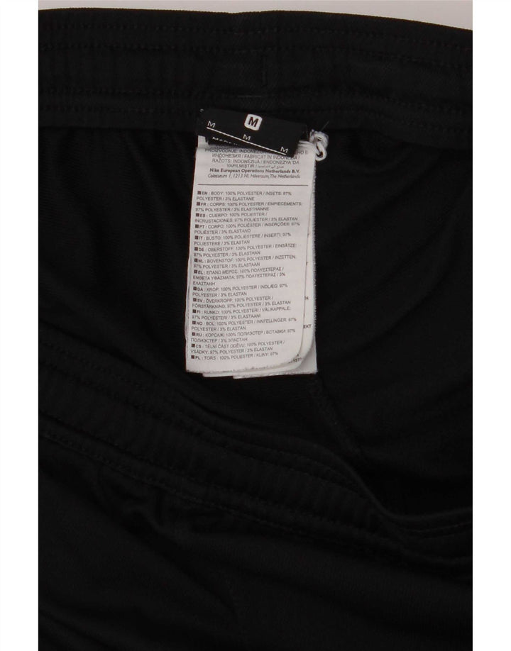 Nike Træningsdragtsbukser til mænd Medium Sort Colourblock Polyester