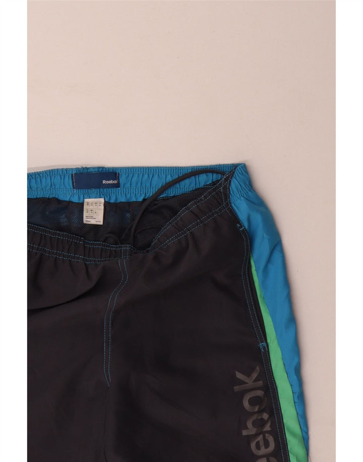 REEBOK Grafiske svømmeshorts til mænd XS Grå Colourblock