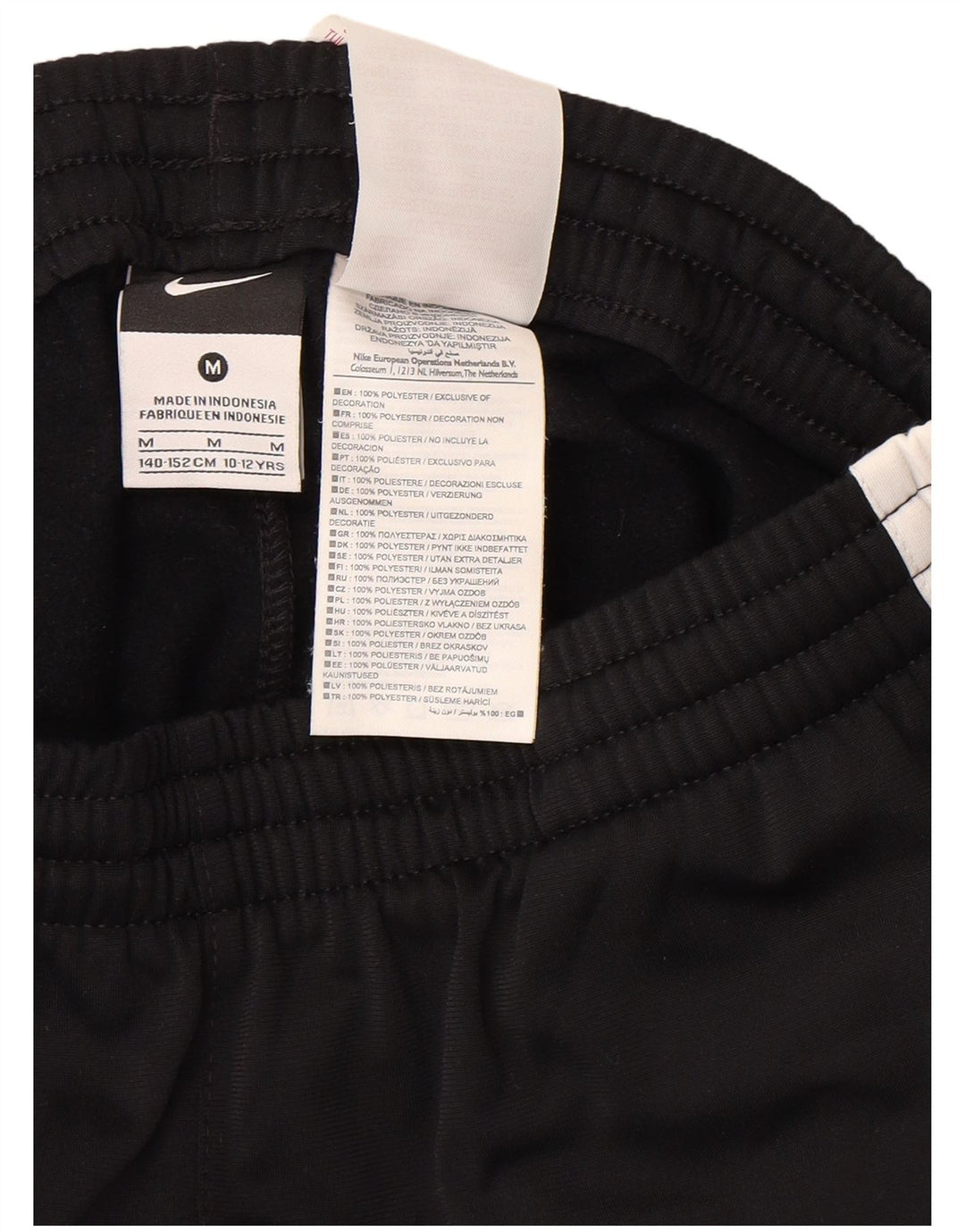 Nike drenge grafiske træningsdragt bukser 10-11 år Medium Sort Colourblock