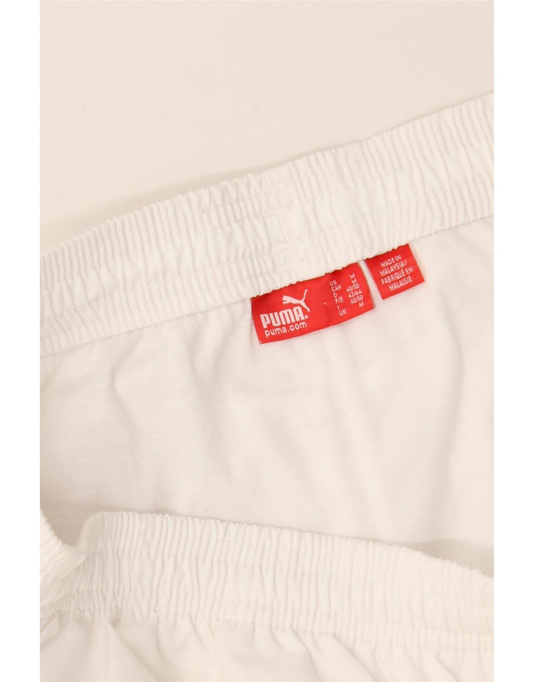 PUMA Mens Graphic Capri Tracksuit Trousers Medium  White Vintage Puma and Second-Hand Puma from Messina Hembry 