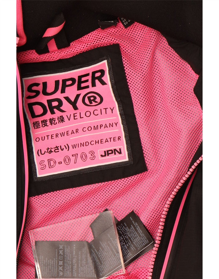 Superdry Windcheater Windbreaker Jacket til kvinder UK 12 Medium Sort