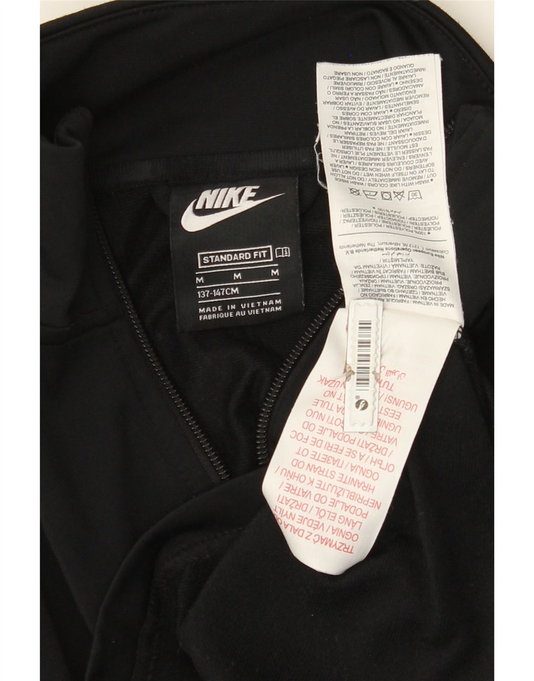 NIKE Boys Standard Graphic Tracksuit Top Jacket 10-11 Years Medium Black