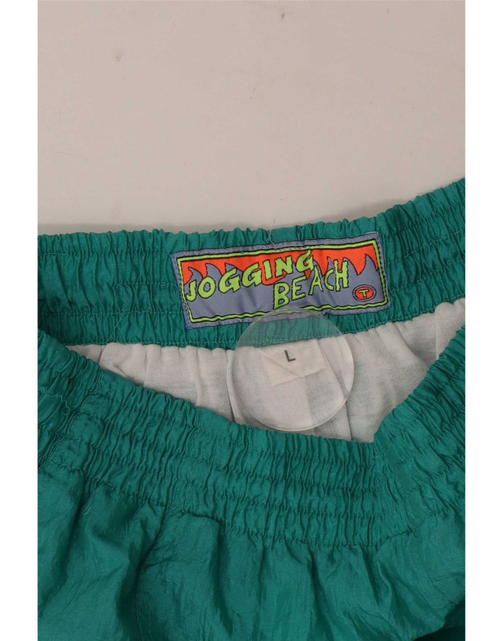 Vintage træningsdragt bukser til mænd Large Green Colourblock Nylon