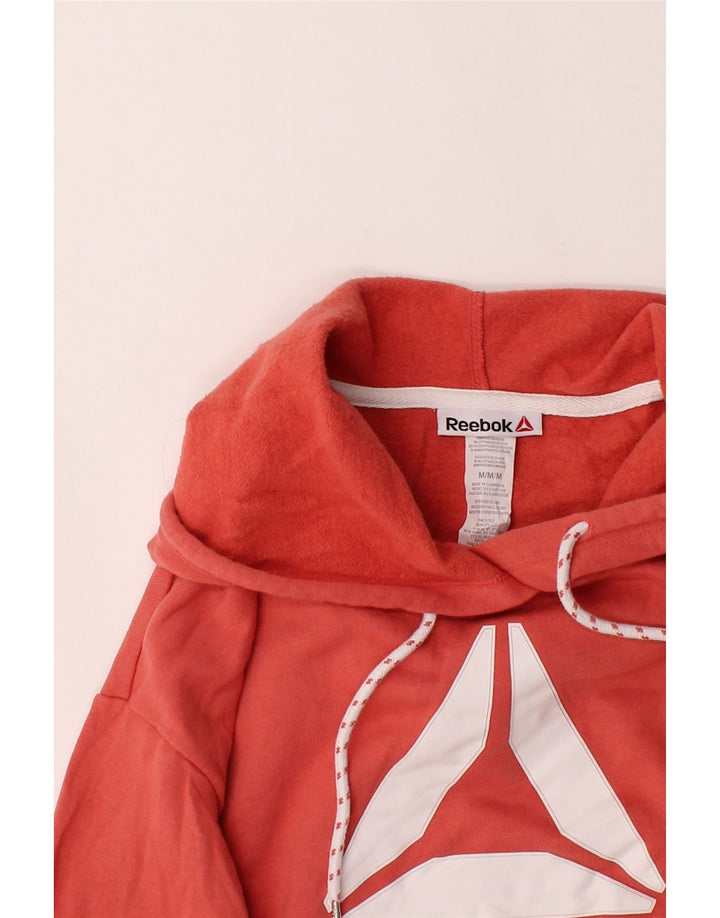 REEBOK Womens Graphic Oversized Hoodie Jumper UK 14 Medium Orange Cotton Vintage Reebok and Second-Hand Reebok from Messina Hembry 