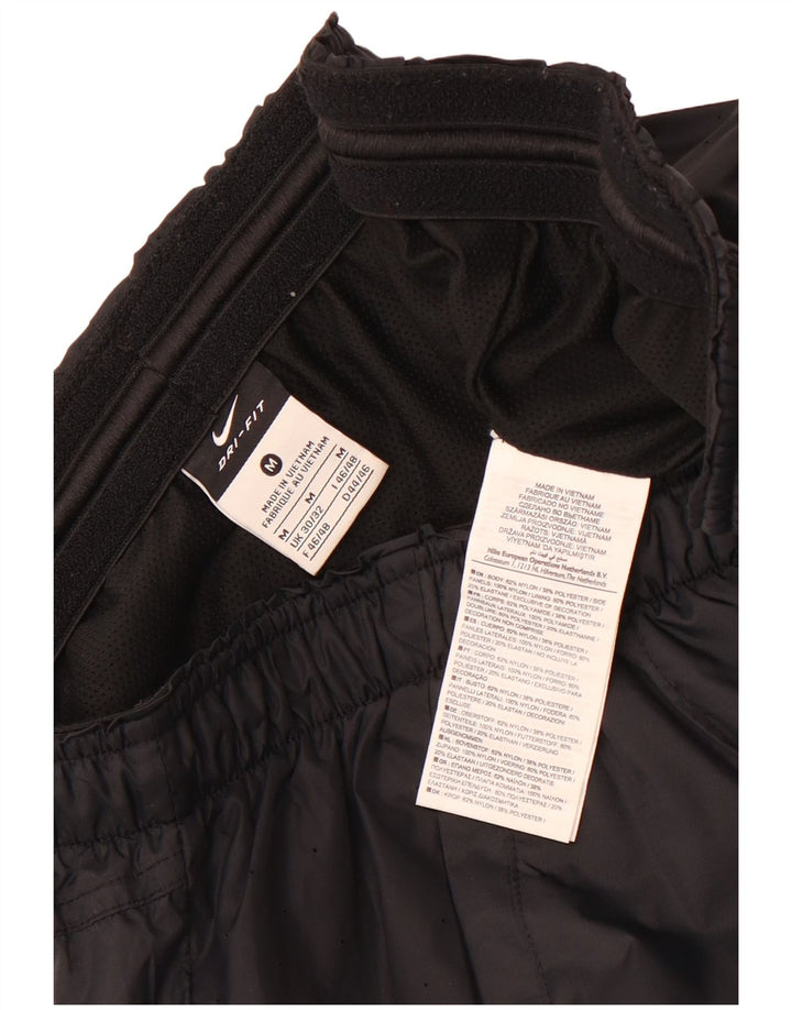 Nike træningsdragtsbukser til kvinder UK 30/32 Medium Sort Nylon