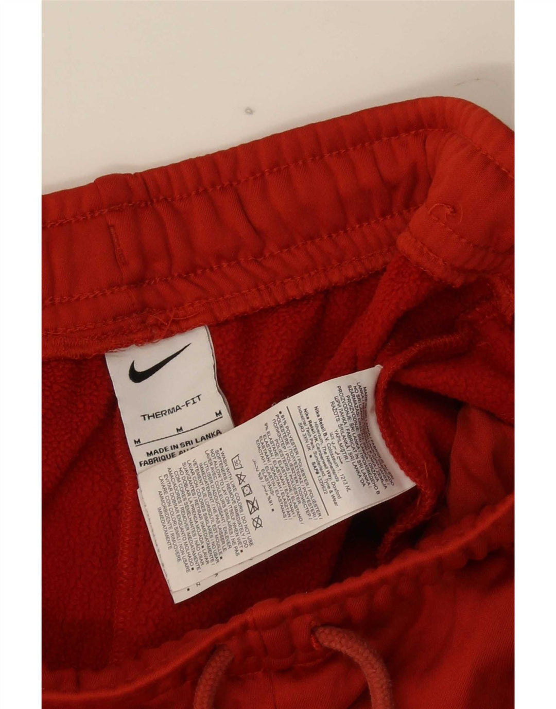 Nike Herre Therma-Fit grafisk træningsdragt Bukser Medium Rød Polyester