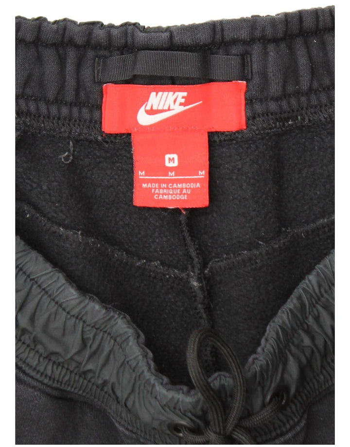 NIKE Træningsdragt til mænd Joggers Medium Sort Bomuld
