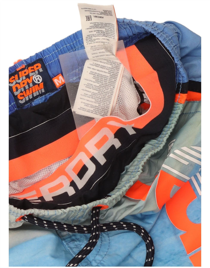 Superdry grafiske badeshorts til mænd mellemblå stribet polyester