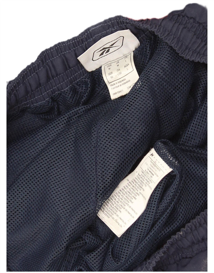 Reebok Herre grafisk træningsdragt Bukser Joggers Medium Navy Blue Colourblock