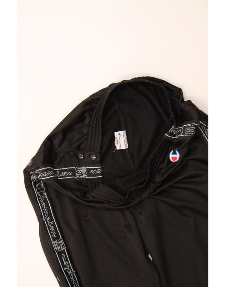 CHAMPION Womens Graphic Tracksuit Trousers UK 12 Medium  Black Polyester Vintage Champion and Second-Hand Champion from Messina Hembry 