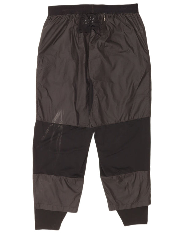 Nike Træningsdragtsbukser til mænd Large Black Colourblock Polyester
