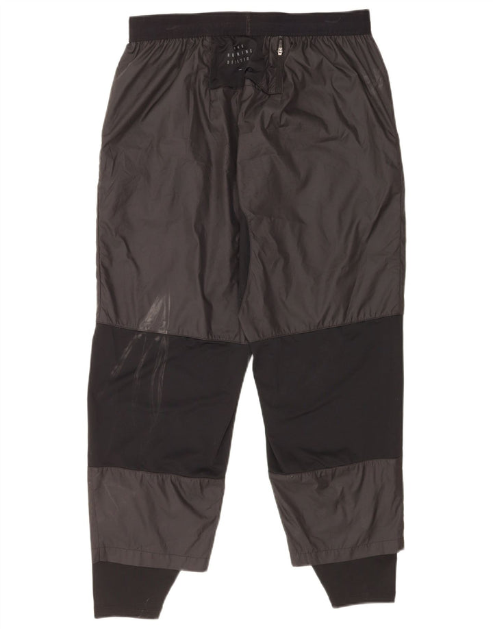 Nike Træningsdragtsbukser til mænd Large Black Colourblock Polyester