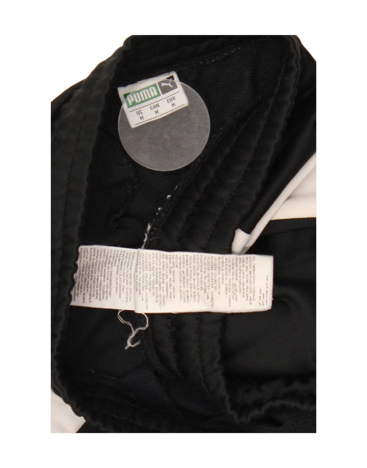 Puma Træningsdragt til mænd Joggers Medium Sort Colourblock Polyester