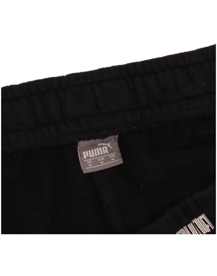 PUMA Grafiske sportsshorts til kvinder UK 12 Medium Sort