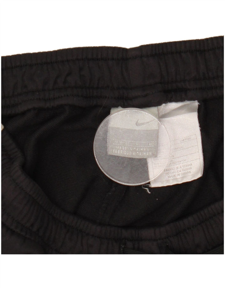 Nike Træningsdragtsbukser til mænd Medium Sort Colourblock Polyester