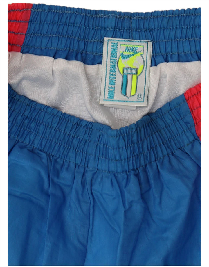 NIKE sportsshorts til kvinder UK 12 Medium Blue Colourblock Nylon