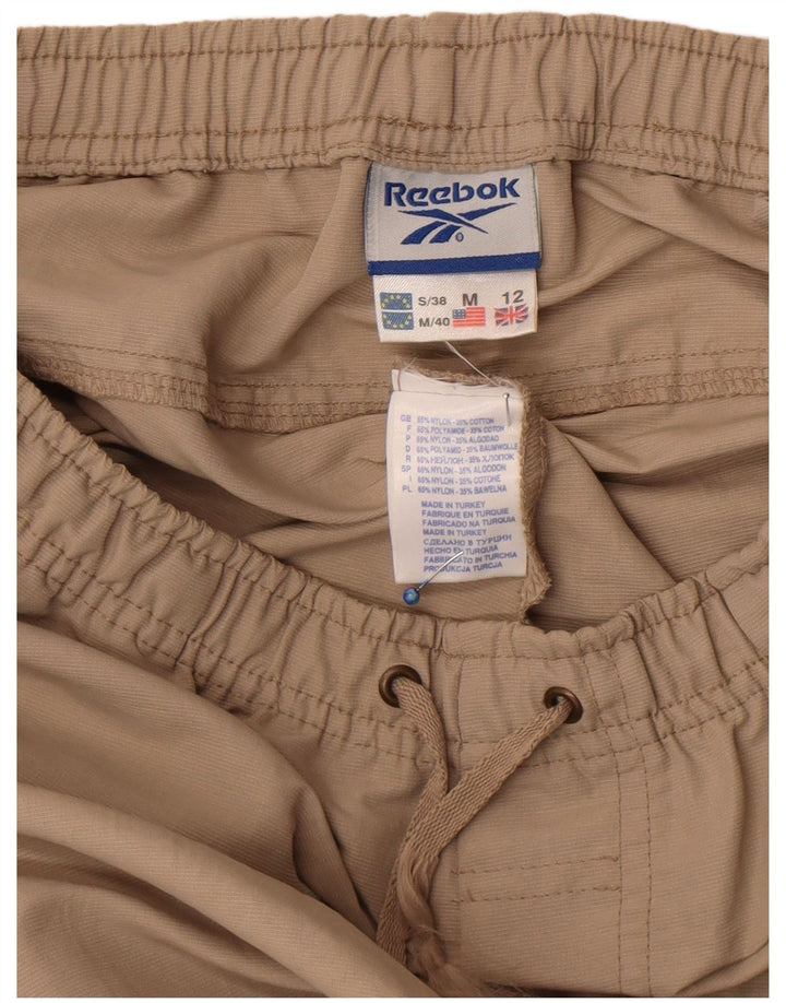 Reebok Træningsdragtsbukser til kvinder UK 12 Medium Beige Nylon