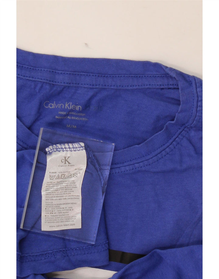 CALVIN KLEIN Mens Graphic T-Shirt Top Medium Blue Colourblock Cotton Vintage Calvin Klein and Second-Hand Calvin Klein from Messina Hembry 