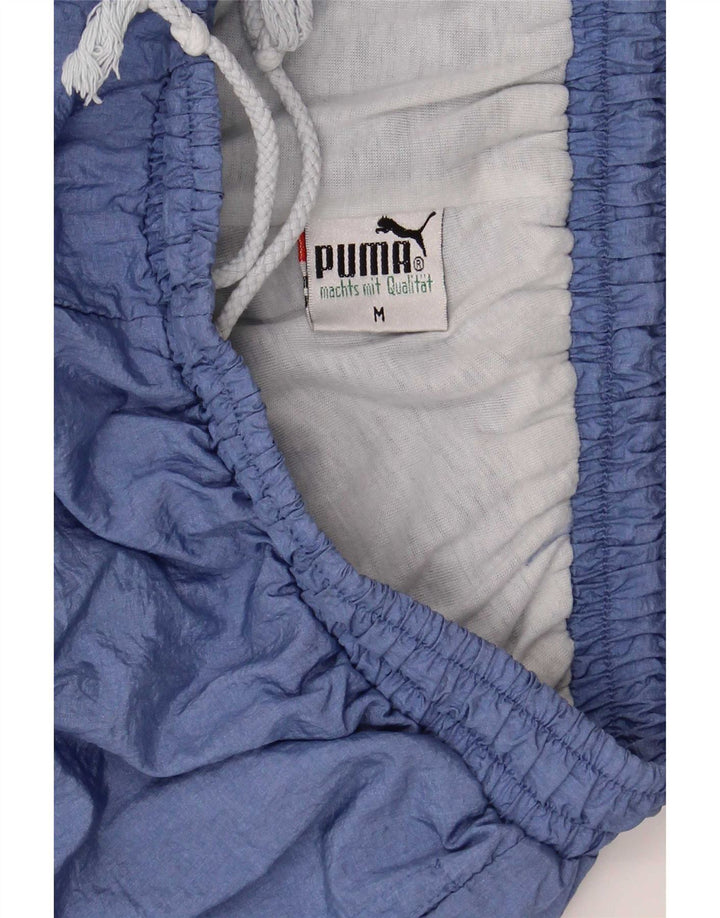 Puma Træningsdragt til mænd Joggers Medium Lilla Colourblock Polyamid