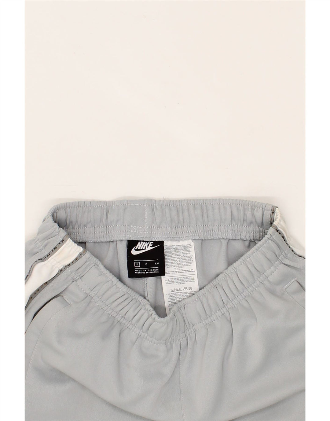 NIKE Træningsdragt bukser til mænd Joggers Small Grå Colourblock Polyester