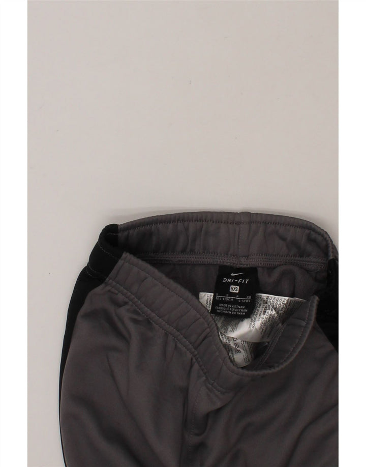 NIKE Boys Dri Fit Tracksuit Trousers Joggers 4-5 Years   Small Grey Vintage Nike and Second-Hand Nike from Messina Hembry 