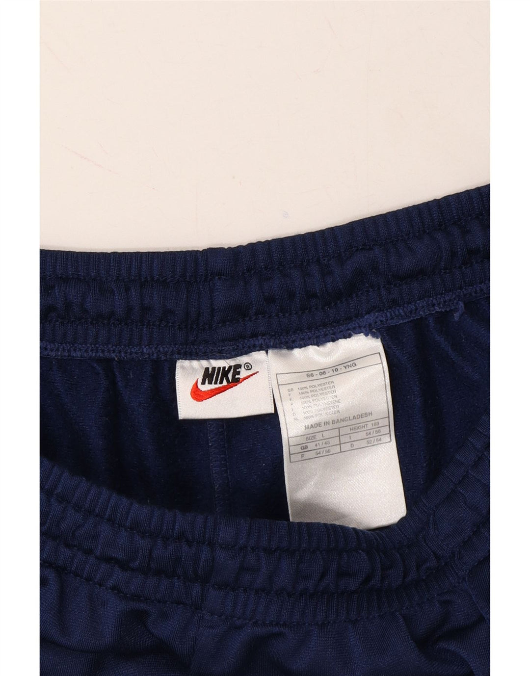 NIKE Mens Tracksuit Trousers UK 41/43 Large Navy Blue Polyester Vintage Nike and Second-Hand Nike from Messina Hembry 